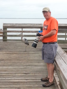 Gerald on the dock with a one-legged Blue Heron at Manatee Hammock County Park.