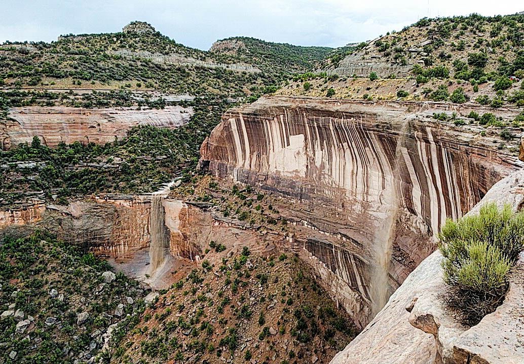 A little rain marks the beginning of muddy waterfalls at Colorado National Monument.