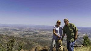 Gerald & Shari Voigt, with our GSD Maggie, posing on Squaw Peak.